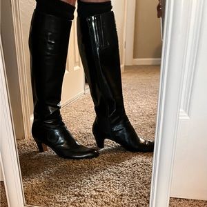 Salvatore Ferragamo vintage 3” heel gusseted black boots with swirling details.